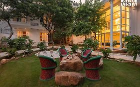 Stayvista's Indraj Manor - Roman-inspired Villa With Posh Interiors, Mesmerizing Garden & Outdoor Fireplace New Delhi India
